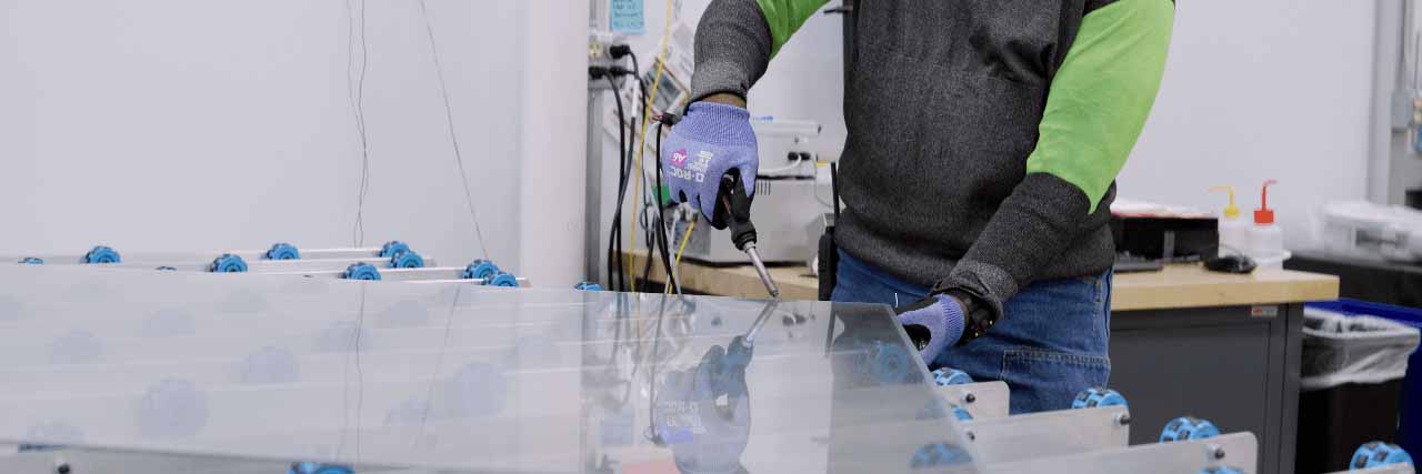 Cardinal CLiC employee working on CLiC Glass